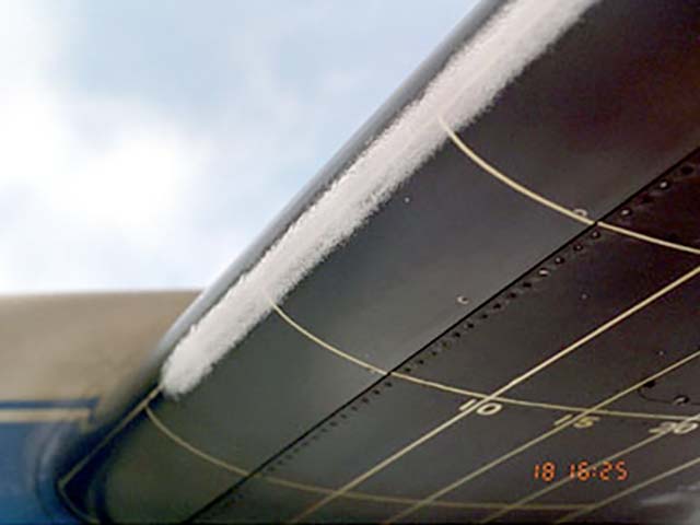 Rime ice on Twin Otter wing leading edge