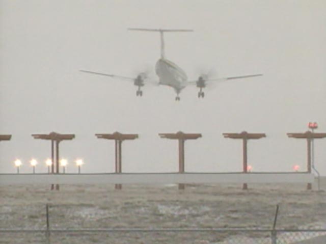 Aircraft landing in reduced visibility conditions
