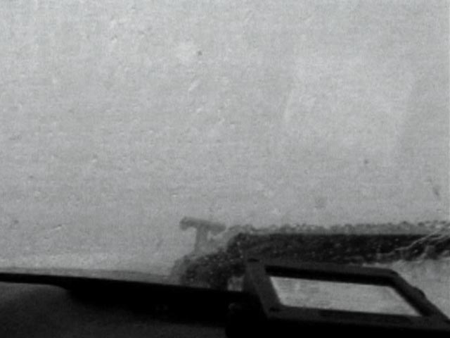 Ice on windshield and wiper