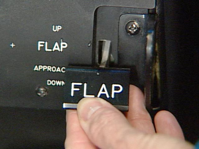 Pilot moving flap switch