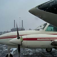 Parked aircraft with frost and snow