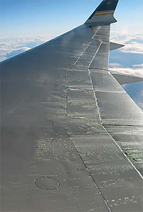Fluid failure on wing of aircraft in flight