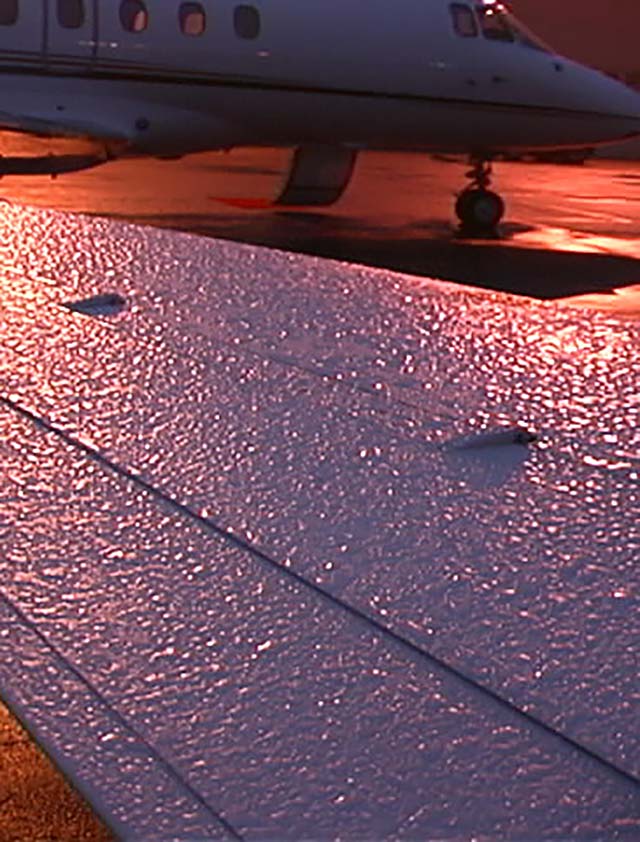 Aircraft with frozen contamination on wing