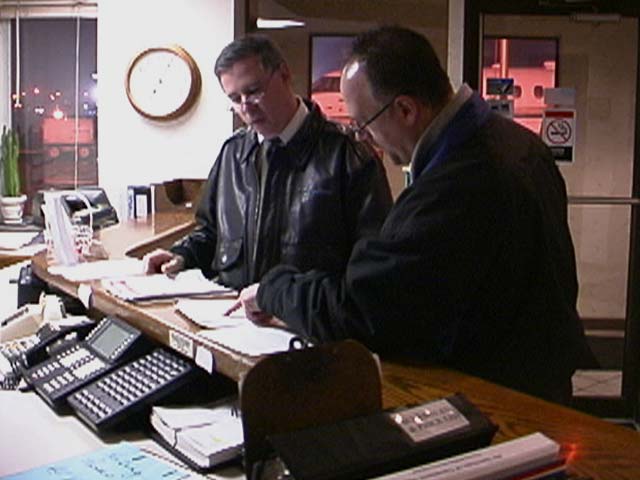 Pilots checking weather information