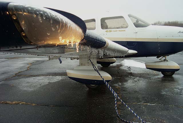 Frozen contamination on aircraft wing and fuselage